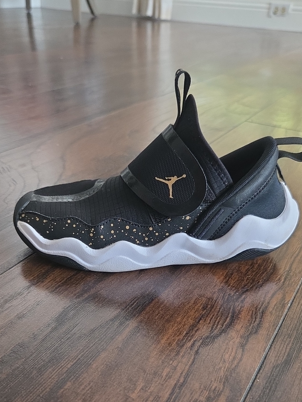 Jordan Kids Black and Gold Slip-On Sneakers